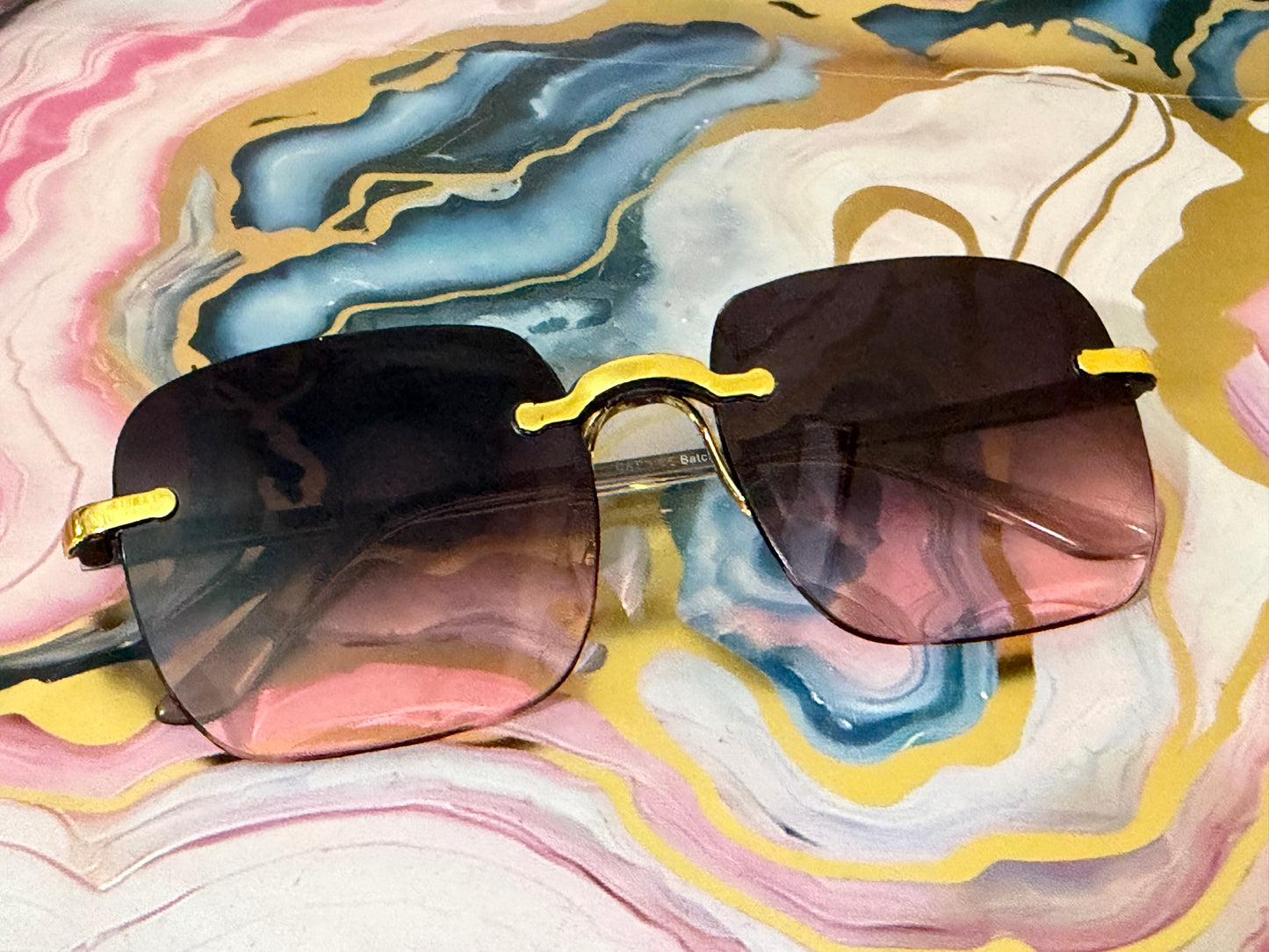 Pink and black sunglasses